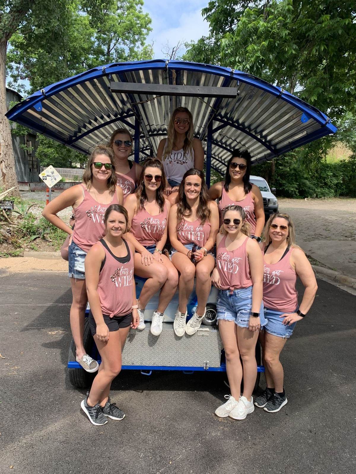 Bachelorette riders aboard the bike